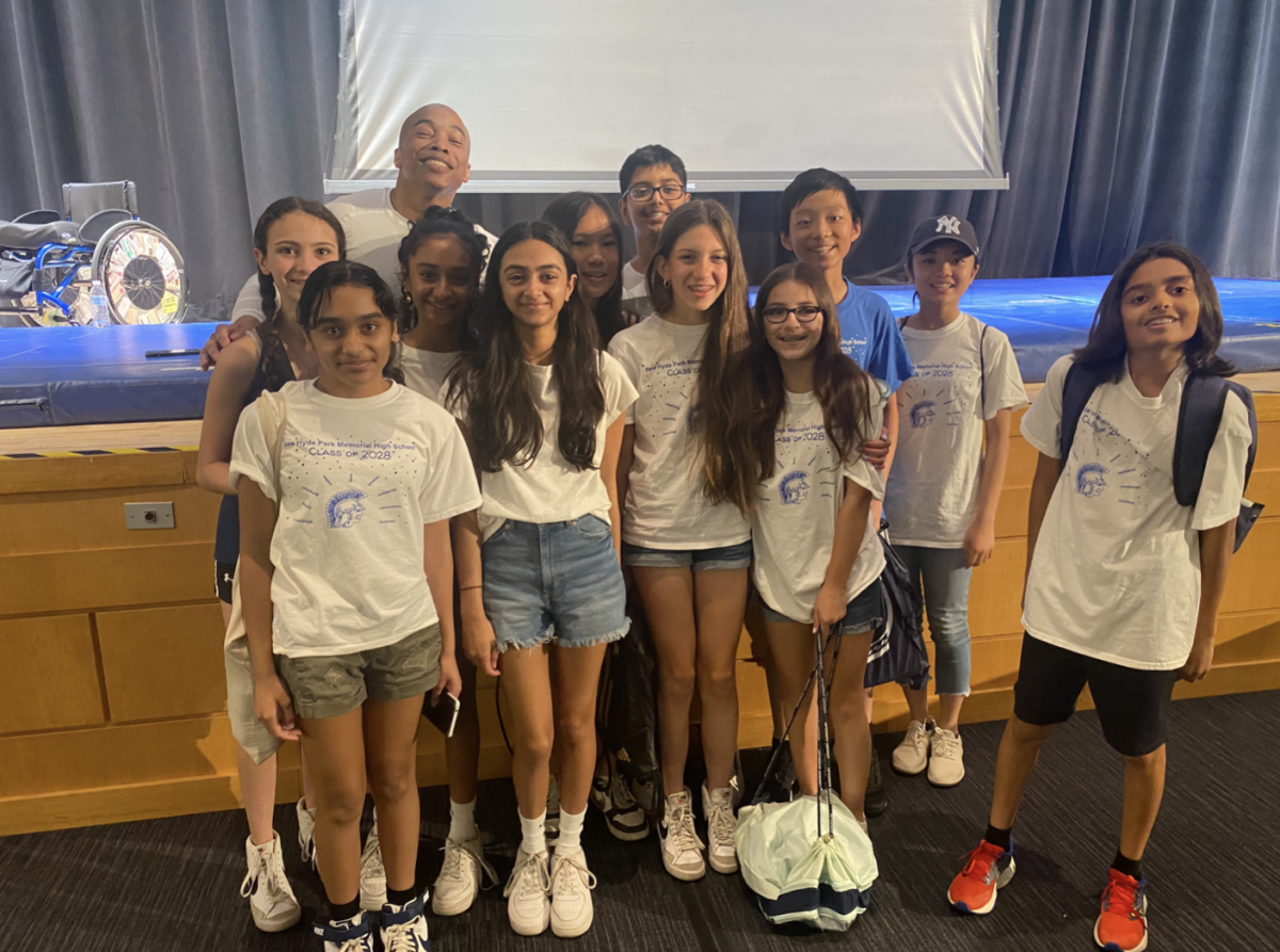 Students pose with youth speaker and wrestler Rohan Murphy. (Source by Ms. Kaspar)